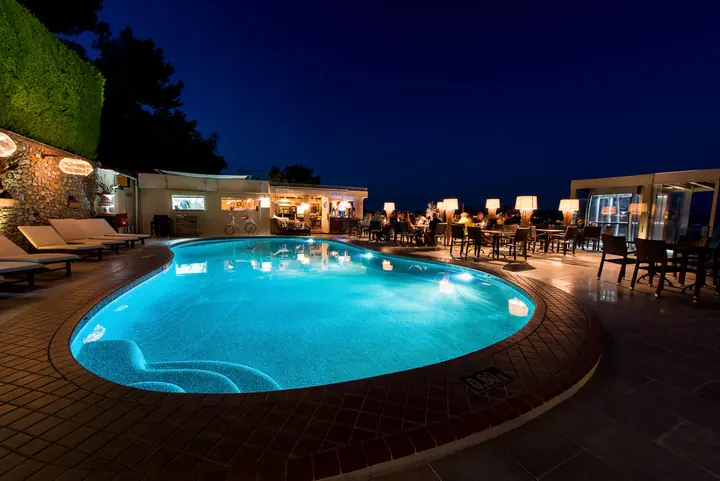 The pool lit up at night