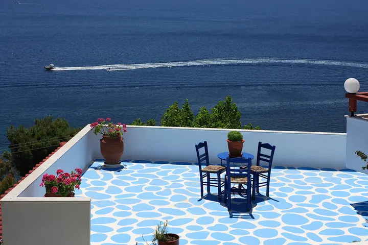 The terrace and a boat passing below