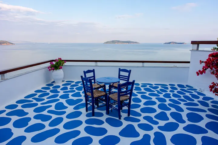 A table for two on the blue pebble terrace